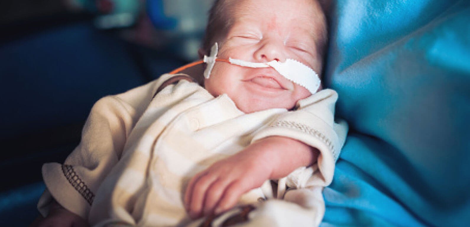 Newborn baby with oxygen support
